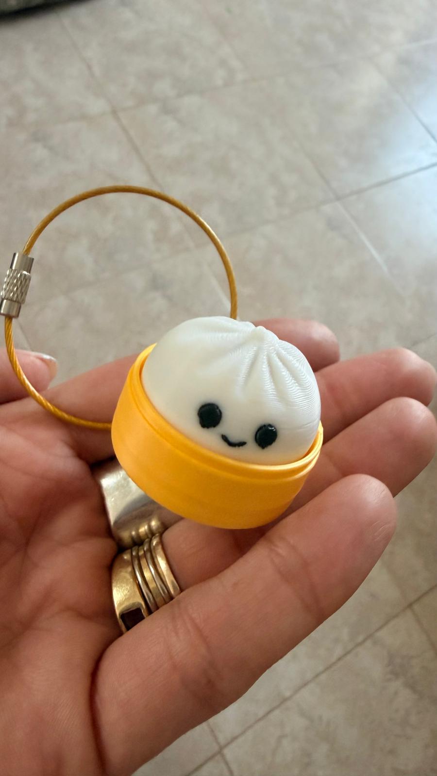Llavero fidget dumpling clicker color amarillo