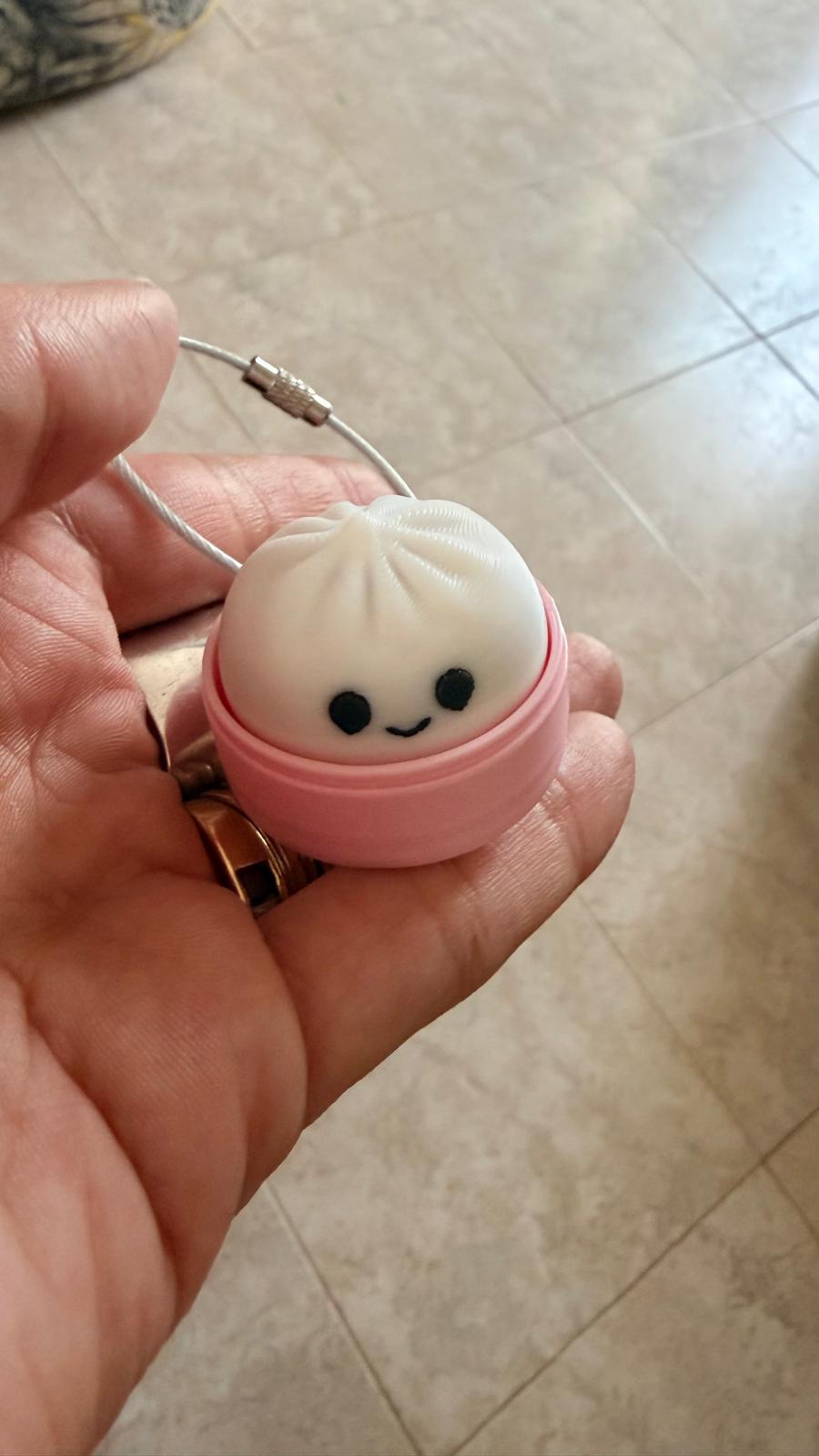 Llavero fidget dumpling clicker color rosa