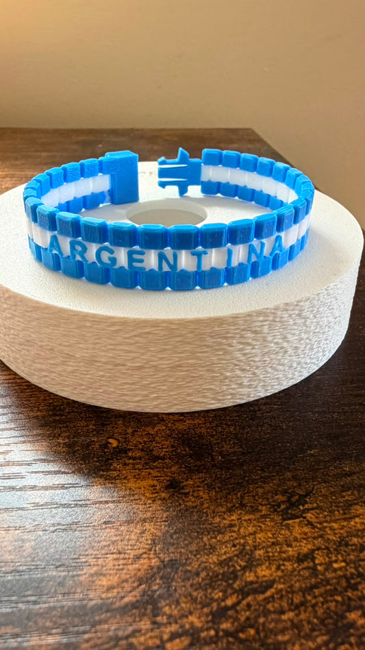 Pulsera brazalete argentina Totesti celeste y blanca con texto Argentina